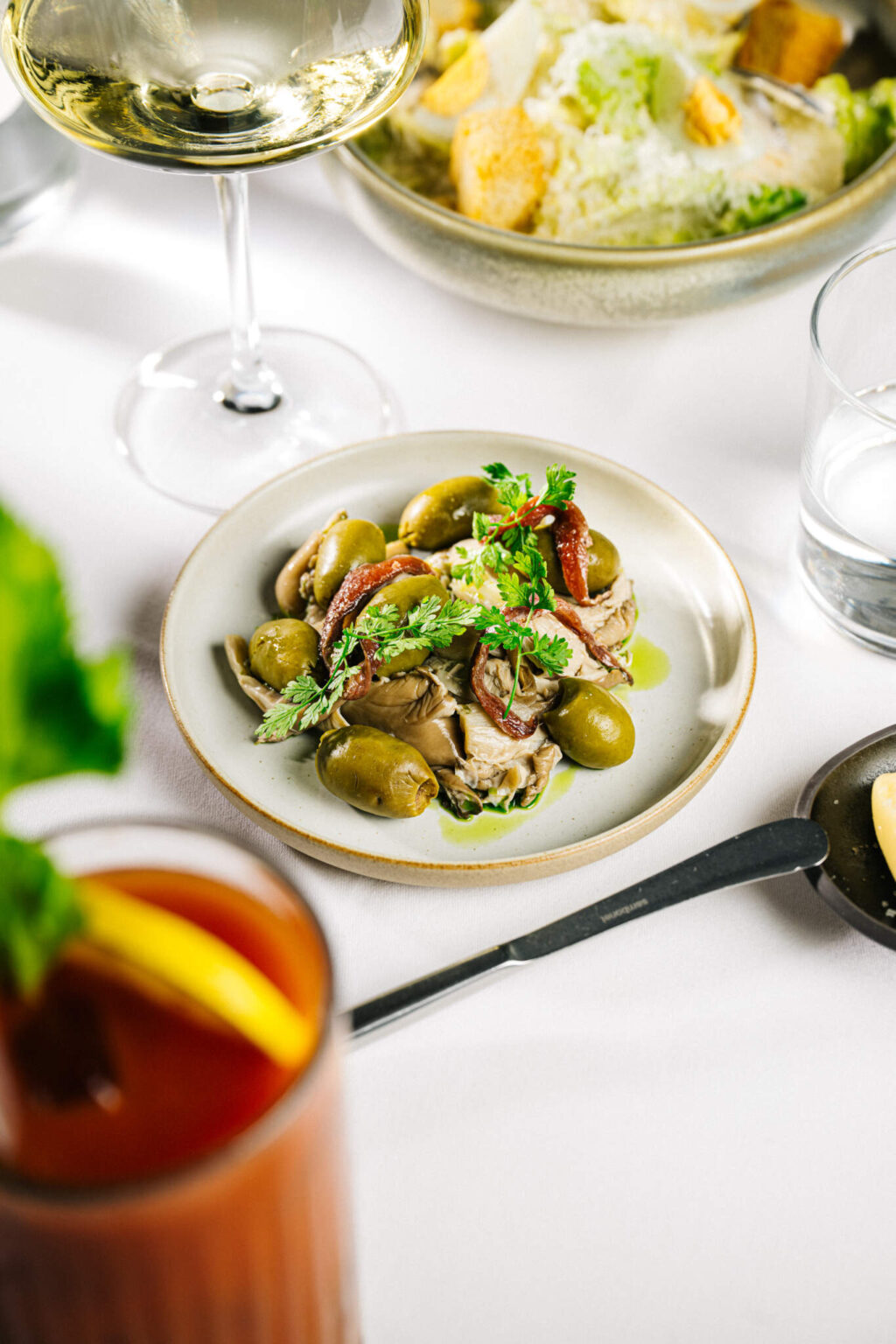 Dish with artichoke, olives and herbs at Harry’s